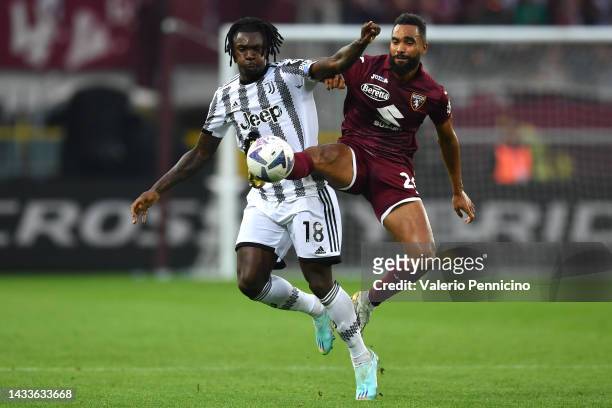 Moise Kean of Juventus is challenged by Koffi Djidji of Torino FC during the Serie A match between Torino FC and Juventus at Stadio Olimpico di...