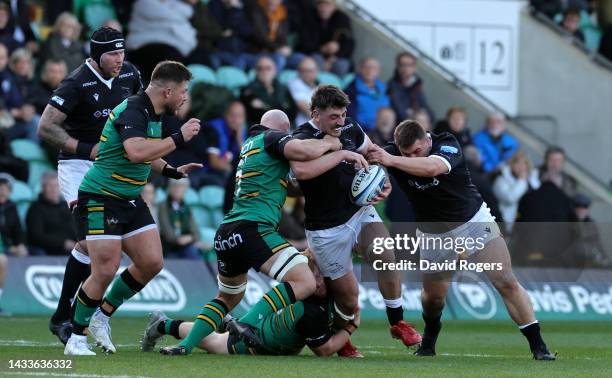 Matthew Dalton of Newcastle Falcons is tackled by Aaron Hinkley during the Gallagher Premiership Rugby match between Northampton Saints and Newcastle...