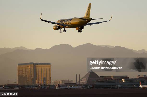Spirit Airlines plane lands at Harry Reid International Airport on October 14, 2022 in Las Vegas, Nevada. Holiday airfare prices are expected to be...