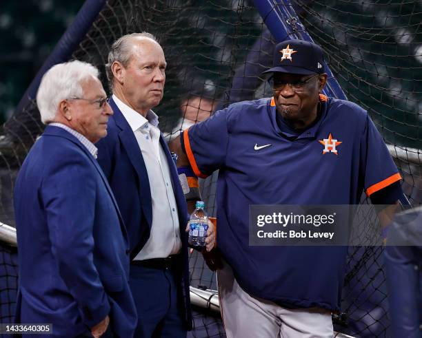 Dusty Baker Jr. #12 of the Houston Astros, right, and owner Jim Crane before playing the Seattle Mariners in the Division Series at Minute Maid Park...