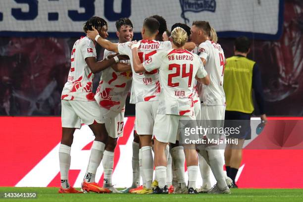 David Raum of RB Leipzig celebrates with teammates after scoring their side's second goal during the Bundesliga match between RB Leipzig and Hertha...