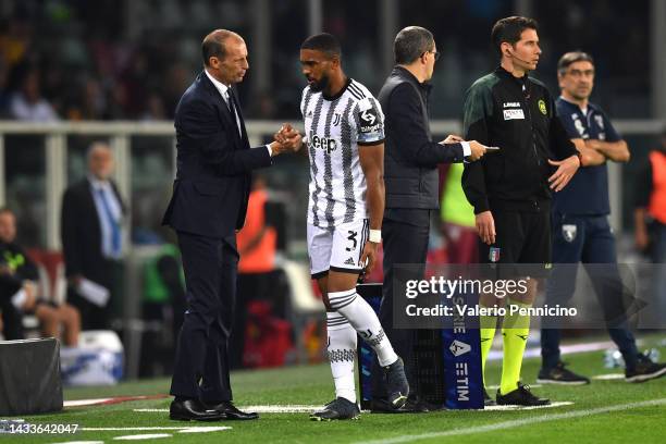 Bremer of Juventus interacts with Massimiliano Allegri, Head Coach of Juventus during the Serie A match between Torino FC and Juventus at Stadio...