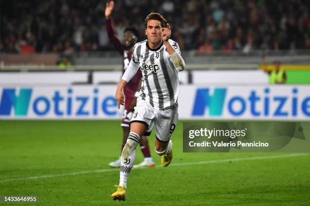 Dusan Vlahovic of Juventus scores their side's first goal during the Serie A match between Torino FC and Juventus at Stadio Olimpico di Torino on...