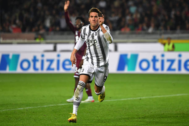 Dusan Vlahovic of Juventus scores their side's first goal during the Serie A match between Torino FC and Juventus at Stadio Olimpico di Torino on...