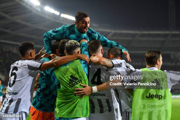 Dusan Vlahovic of Juventus celebrates with teammates after scoring their side's first goal during the Serie A match between Torino FC and Juventus at...