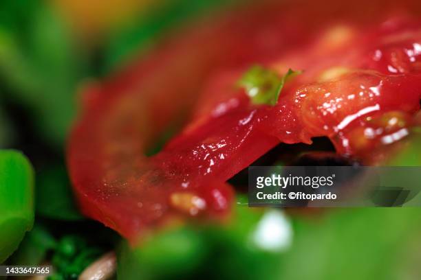 tomato salad extreme close-up - fitopardo stock pictures, royalty-free photos & images