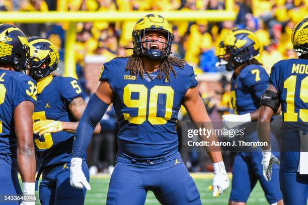 Mike Morris of the Michigan Wolverines reacts after a Michigan defensive stop during the first half of a college football game against the Penn State...