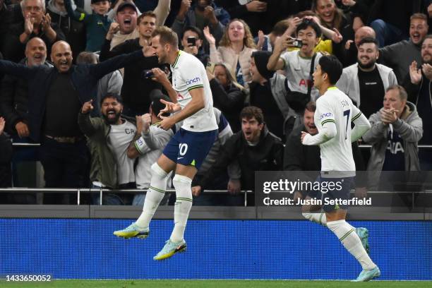 Harry Kane of Tottenham Hotspur celebrates after scoring their team's first goal from the penalty spot during the Premier League match between...