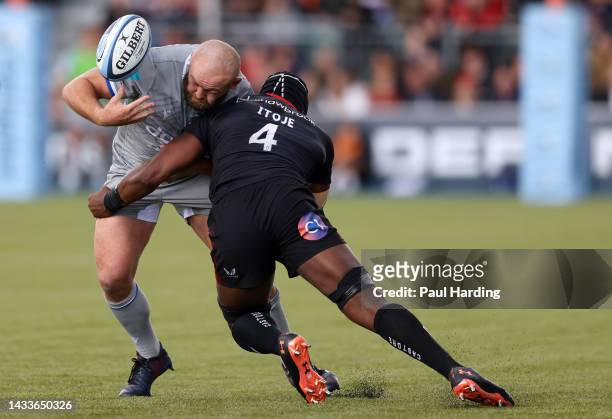 Tom Dunn of Bath is tackled by Maro Itoje of Saracens during the Gallagher Premiership Rugby match between Saracens and Bath Rugby at StoneX Stadium...
