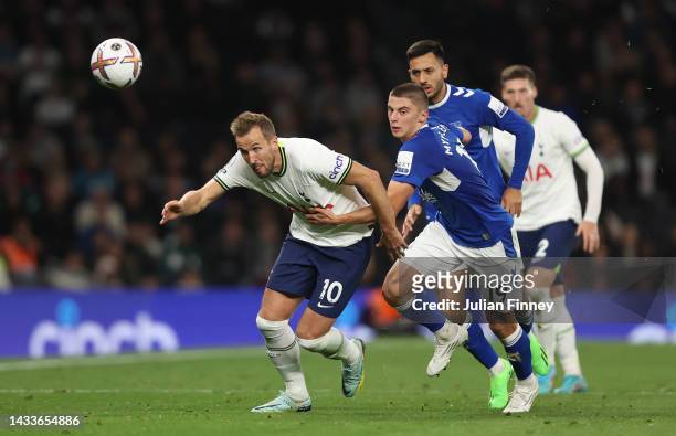 Harry Kane of Tottenham Hotspur is challenged by Vitaliy Mykolenko of Everton during the Premier League match between Tottenham Hotspur and Everton...