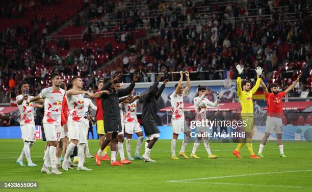 Players of RB Leipzig acknowledges the fans following the Bundesliga match between RB Leipzig and Hertha BSC at Red Bull Arena on October 15, 2022 in...