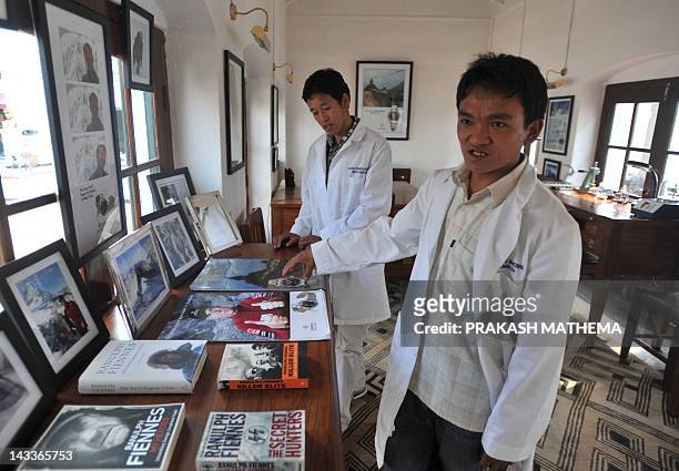 Nepalese watchmakers Ang Namgel Sherpa and Lakpa Thundu Sherpa are pictured at the Kobold watch workshop in Kathmandu on April 25, 2012. AFP...