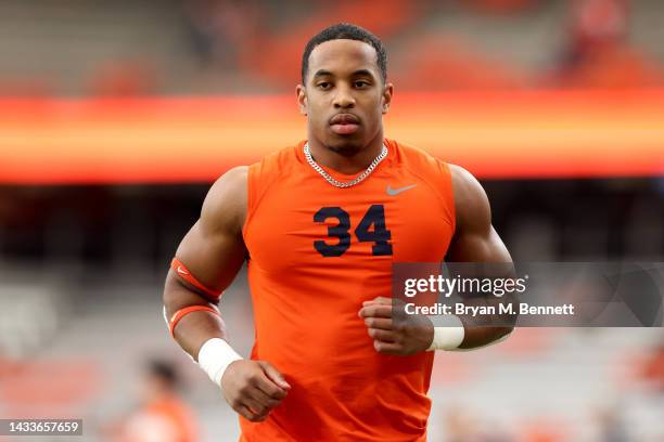 Sean Tucker of the Syracuse Orange warms up prior to a game against the North Carolina State Wolfpack at JMA Wireless Dome on October 15, 2022 in...