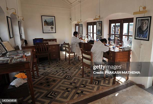 Nepalese watchmaker Ang Namgel Sherpa and Lakpa Thundu Sherpa work on timepieces at the Kobold watch workshop in Kathmandu on April 25, 2012. AFP...