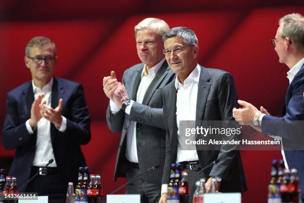 The newly elected FC Bayern München President Herbert Hainer reacts during the annual general meeting of football club FC Bayern Muenchen at Audi...