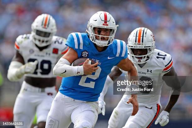 Jaxson Dart of the Mississippi Rebels carries the ball during the second half against the Auburn Tigers at Vaught-Hemingway Stadium on October 15,...