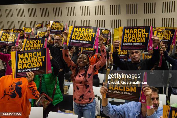 The audience in London applaud a speaker at the Stand Up To Racism international conference on October 15, 2022 in London, England.