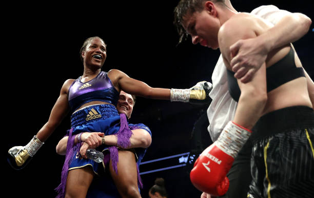 Caroline Dubois celebrates with Trainer Shane McGuigan after victory in the Lightweight fight between Caroline Dubois and Milena Koleva on the...