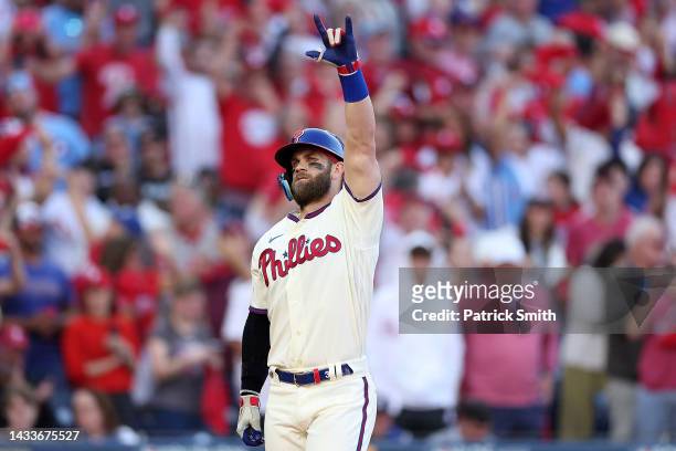 Bryce Harper of the Philadelphia Phillies celebrates a home run against the Atlanta Braves during the eighth inning in game four of the National...