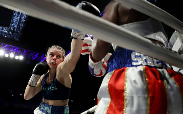 Savannah Marshall punches Claressa Shields during the IBF, WBA, WBC, WBO World Middleweight Title fight between Claressa Shields and Savannah...