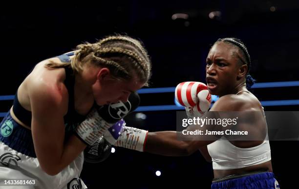 Claressa Shields punches Savannah Marshall during the IBF, WBA, WBC, WBO World Middleweight Title fight between Claressa Shields and Savannah...