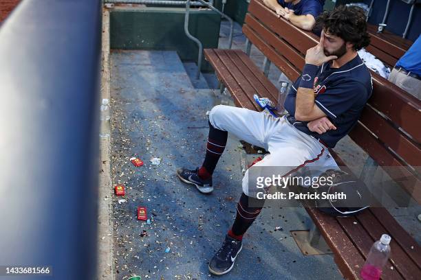 Dansby Swanson of the Atlanta Braves sits in the dugout after losing to the Philadelphia Phillies in game four of the National League Division Series...