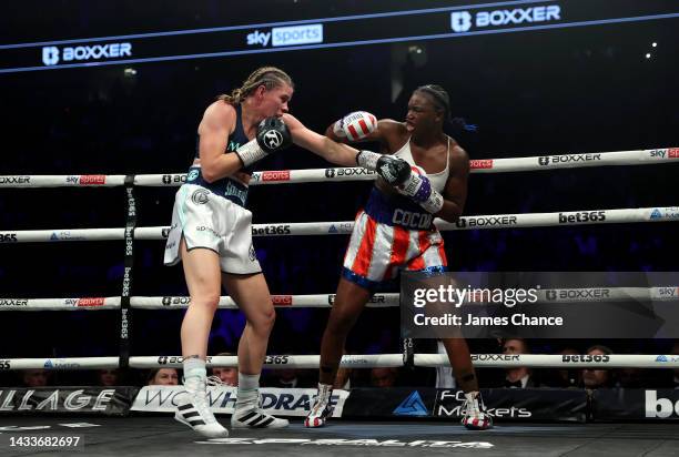 Claressa Shields punches Savannah Marshall during the IBF, WBA, WBC, WBO World Middleweight Title fight between Claressa Shields and Savannah...