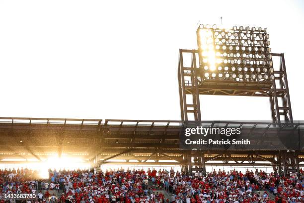 Fans watch p;lay between the Atlanta Braves and the Philadelphia Phillies in game four of the National League Division Series at Citizens Bank Park...