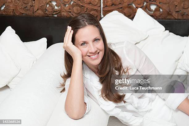 Dana Schweiger poses during a portrait session at the Puro Beach Club Palma de Mallorca on March 31, 2012 in Palma de Mallorca, Spain.