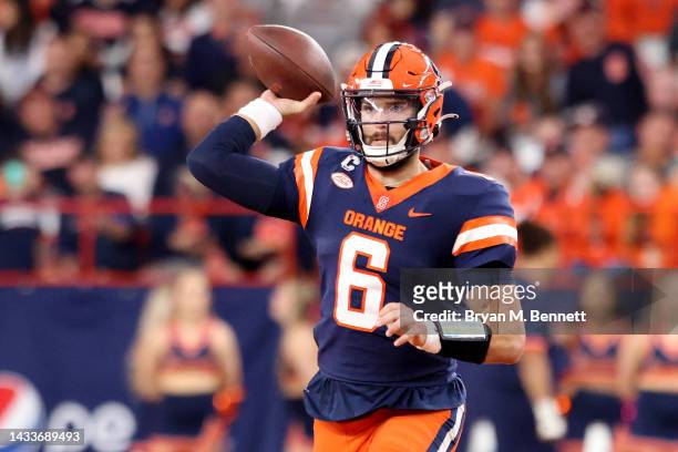 Garrett Shrader of the Syracuse Orange passes the ball during the second quarter against the North Carolina State Wolfpack at JMA Wireless Dome on...