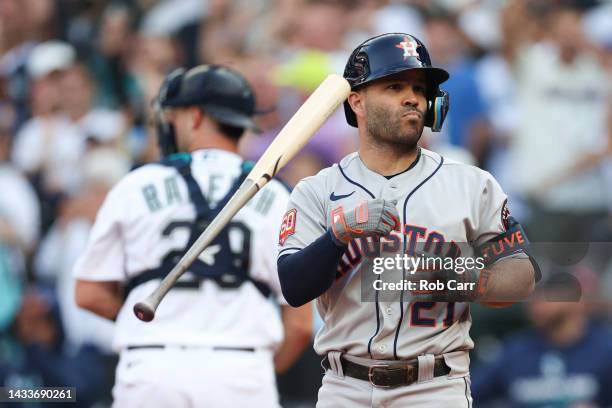 Jose Altuve of the Houston Astros strikes out during the ninth inning against the Seattle Mariners in game three of the American League Division...