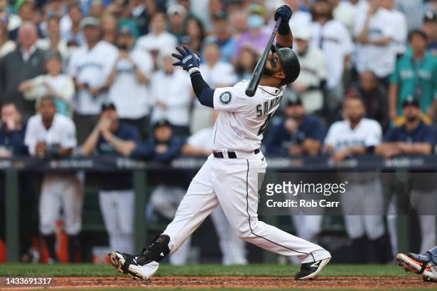 Carlos Santana of the Seattle Mariners fouls off a pitch during the ninth inning against the Houston Astros in game three of the American League...