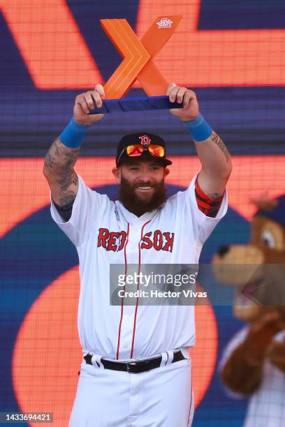 Jonny Gomes of the Boston Red Sox celebrates with the champions trophy of the FTX MLB Home Run Derby X at Campo Marte on October 15, 2022 in Mexico...