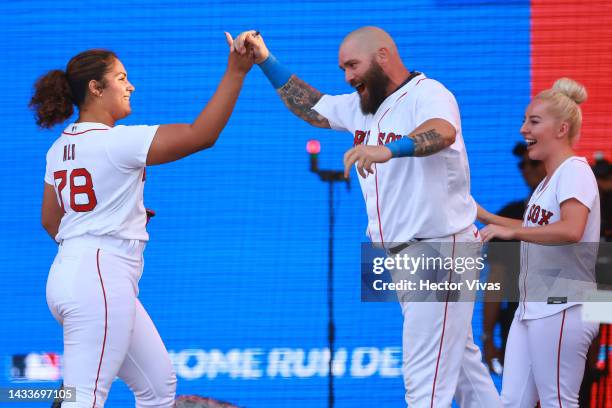 Jonny Gomes and Jocelyn Alo of the Boston Red Sox celebrates celebrates during the FTX MLB Home Run Derby X at Campo Marte on October 15, 2022 in...