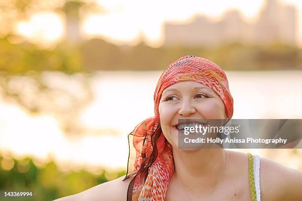 Woman with cancer wearing scarf