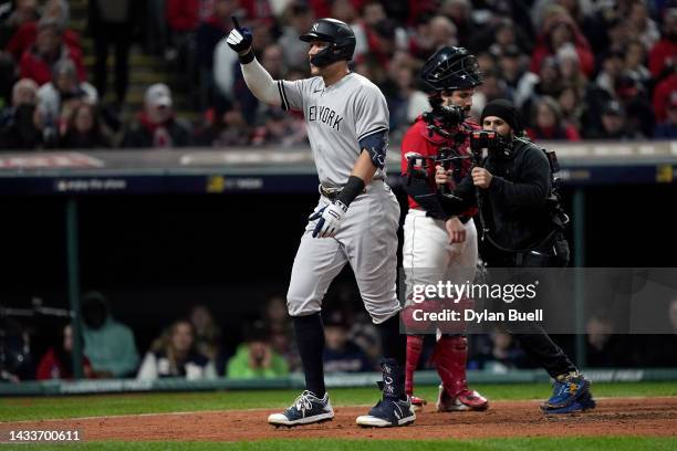 Aaron Judge of the New York Yankees celebrates after hitting a two run home run during the third inning against the Cleveland Guardians in game three...