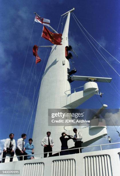 The mast above the bridge of the Cunard liner QE2, which has been refitted as a troopship and is heading for the Falkland Islands during the...