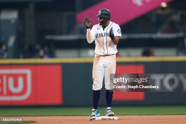 Julio Rodriguez of the Seattle Mariners steals second base during the thirteenth inning against the Houston Astros in game three of the American...