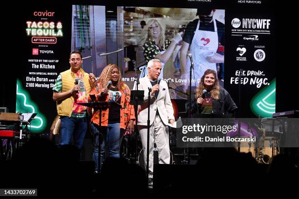 Jeff Mauro, Sunny Anderson, Geoffrey Zakarian, and Alex Guarnaschelli speak onstage during the Food Network New York City Wine & Food Festival...