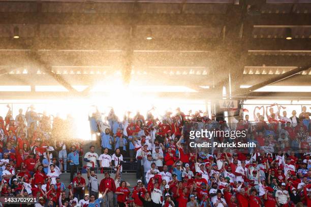 Fans watch play between the Atlanta Braves and the Philadelphia Phillies in game four of the National League Division Series at Citizens Bank Park on...