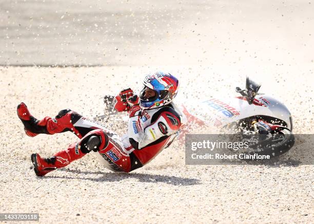 Mario Suryo Aji of Indonesia and rider of the Honda Team Asia Honda, crashes out of the Moto3 race during the MotoGP of Australia at Phillip Island...