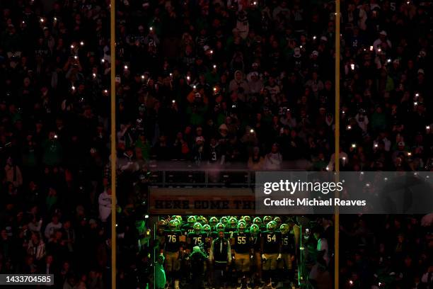 Head coach Marcus Freeman of the Notre Dame Fighting Irish waits to lead the team on to the field prior to the game against the Stanford Cardinal at...