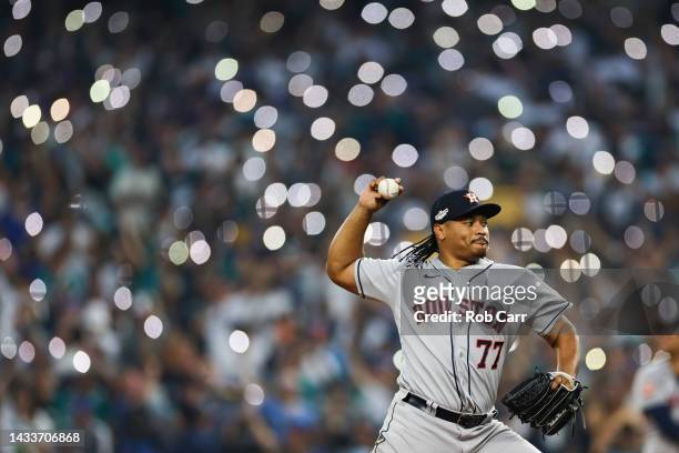 Luis Garcia of the Houston Astros warms up during the fifteenth inning against the Seattle Mariners in game three of the American League Division...