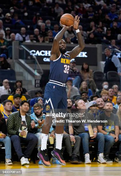 Jeff Green of the Denver Nuggets shoots a three-point shot against the Golden State Warriors during the first half of an NBA basketball game at Chase...
