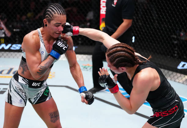Alexa Grasso of Mexico punches Viviane Araujo of Brazil in a flyweight fight during the UFC Fight Night event at UFC APEX on October 15, 2022 in Las...
