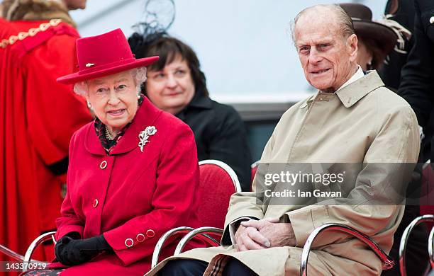 Queen Elizabeth II and Prince Philip, Duke of Edinburgh attend the opening of the restored 'Cutty Sark' Tea Clipper at Greenwich on April 25, 2012 in...