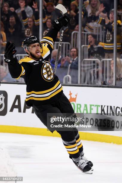 Greer of the Boston Bruins celebrates after scoring a goal against the Arizona Coyotes during the third period at TD Garden on October 15, 2022 in...