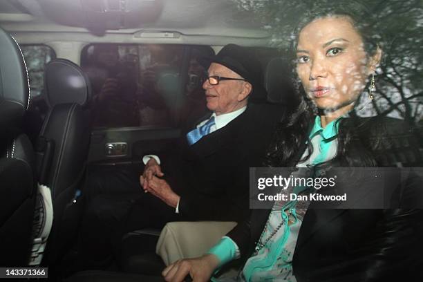 Rupert Murdoch and wife Wendi Deng Murdoch leave the High Court after giving evidence to the Leveson Inquiry on April 25, 2012 in London, England....