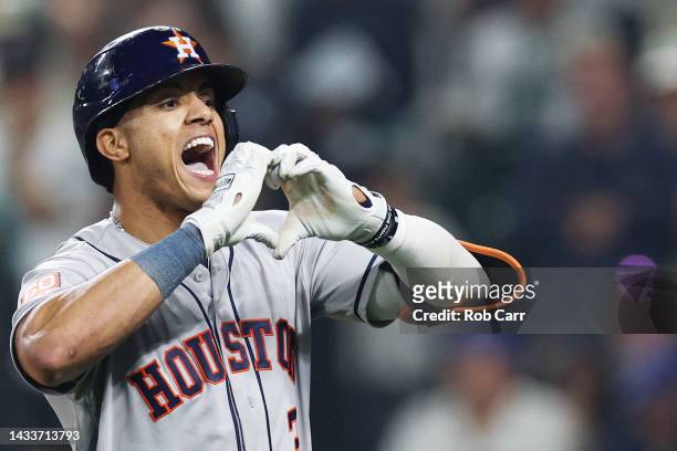 Jeremy Pena of the Houston Astros reacts after hitting a solo home run during the eighteenth inning against the Seattle Mariners in game three of the...