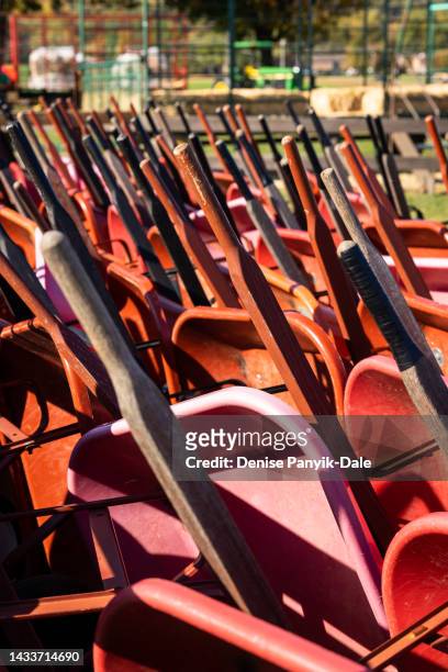 wheelbarrows stacked in pumpkin patch - panyik-dale stock pictures, royalty-free photos & images